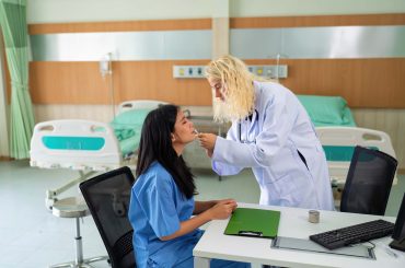 Young woman consult with doctor for botulinum toxin botox face injection at beauty treatment clinic